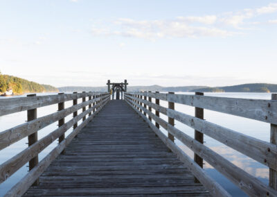 A long pier stretching out over beautiful waters of the Puget Sound