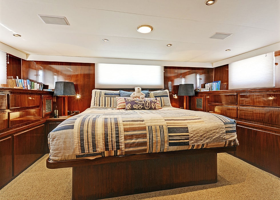 The California King bed as seen in the master Stateroom aboard our charter yacht, Northern Light
