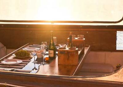 A table setting at sunset on our charter yacht in Seattle